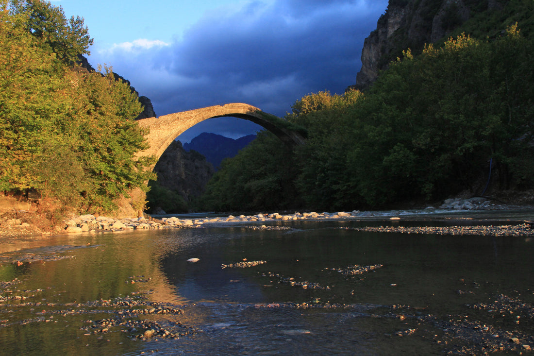 The single-arch stone bridge of Konitsa over the Aoos river, Epirus, Greece