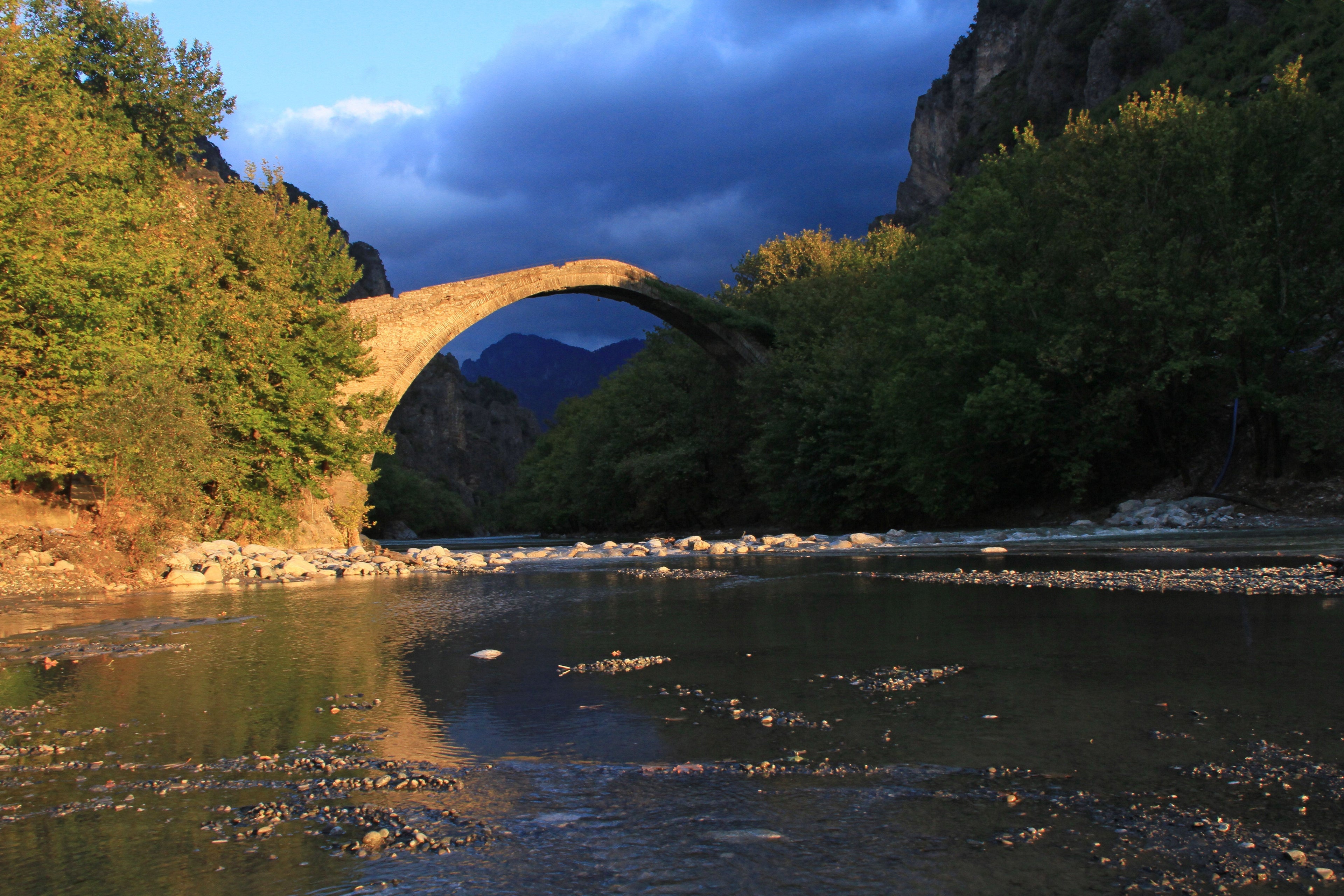 The single-arch stone bridge of Konitsa over the Aoos river, Epirus, Greece