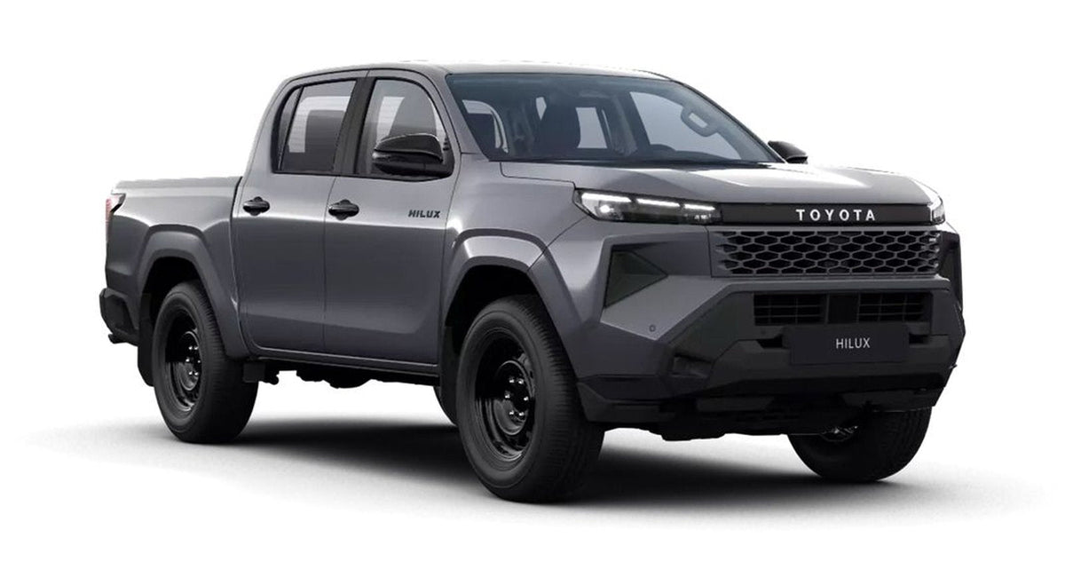 Stock Toyota Hilux double cab in grey — the starting point of the CamperJimny overland build